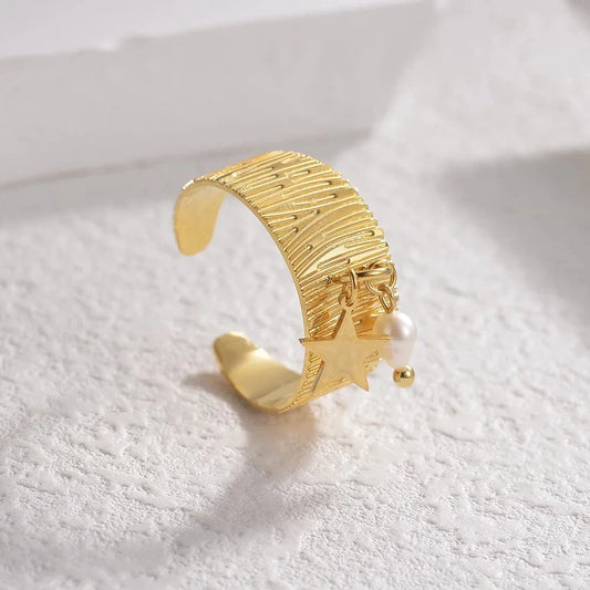 Bijoux Charm Bague à Charm blanche et étoile dorée