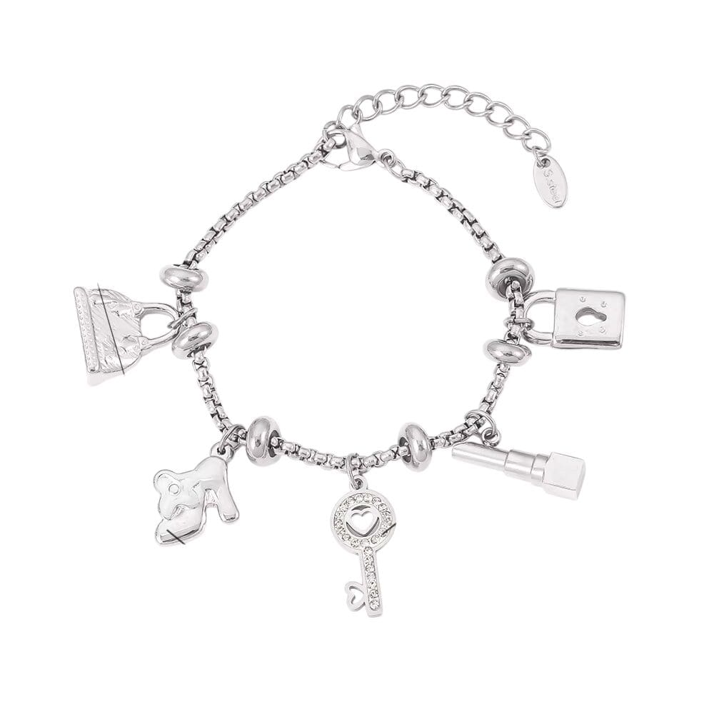 Bijoux Charm Bracelet à charms argenté avec clips et clé brillante