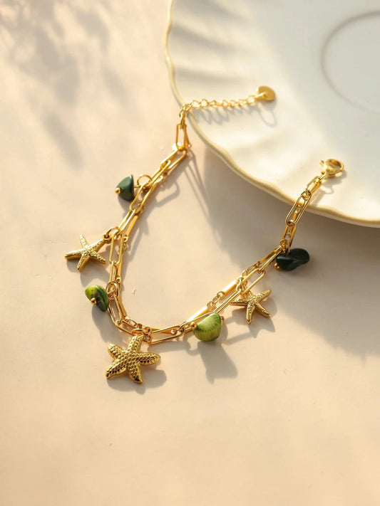 Bijoux Charm Bracelet à charms avec étoile de mer et pierres vertes