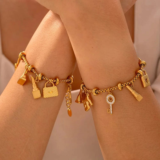 Bijoux Charm Bracelet à charms doré avec clips et clé brillante