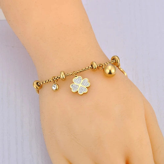 Bijoux Charm Bracelet en or avec charms et clips, orné d'un trèfle à 4 feuilles