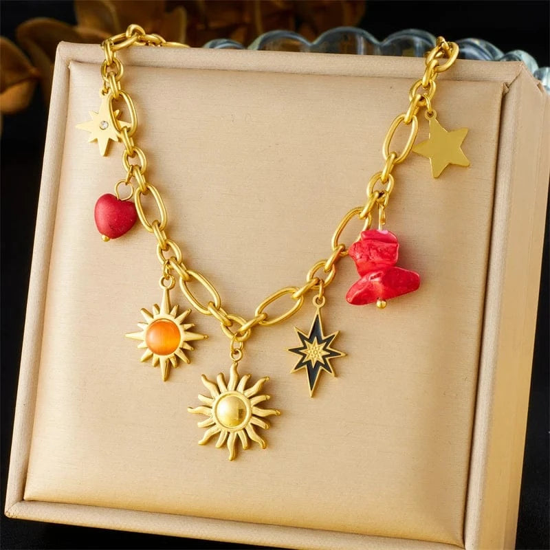 Bijoux Charm Collier à charms doré et soleils
