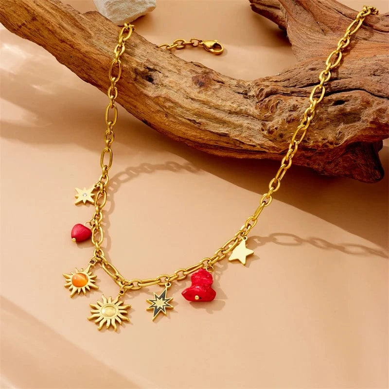 Bijoux Charm Collier à charms doré et soleils