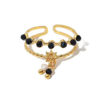 Bijoux Charm Bague à charms blanches et noires dorées