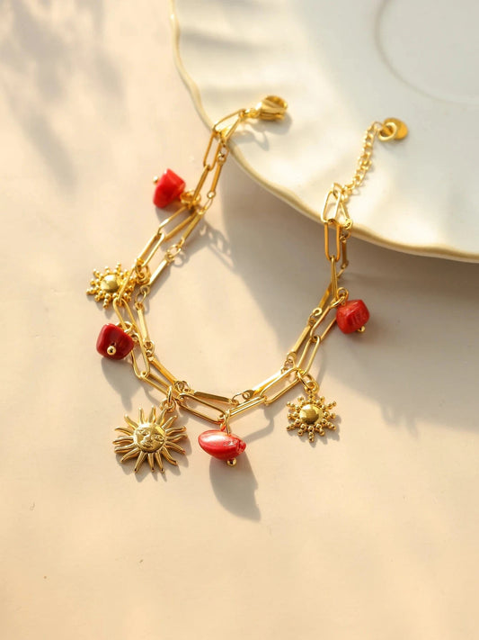 Bijoux Charm Bracelet à charms avec soleil et pierres rouges
