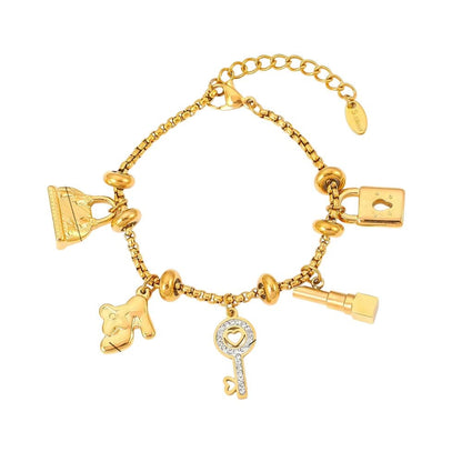Bijoux Charm Bracelet à charms doré avec clips et clé brillante