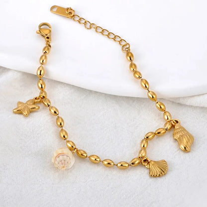 Bijoux Charm Bracelet doré à charms avec coquillage élégant