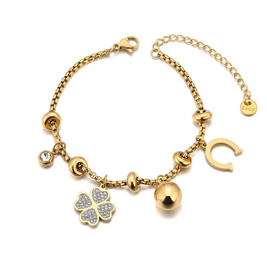 Bijoux Charm Bracelet en or avec charms et clips, orné d'un trèfle à 4 feuilles
