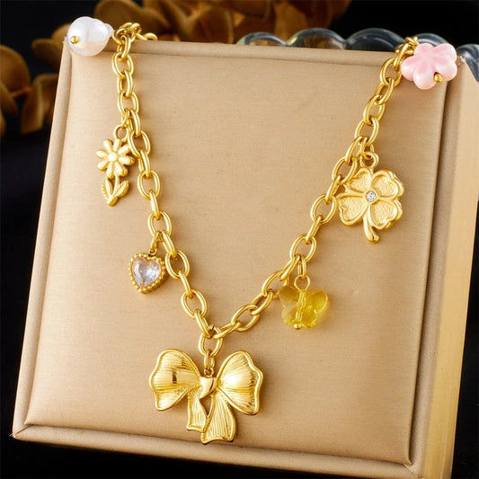 Bijoux Charm Collier à charms avec nœud papillon doré