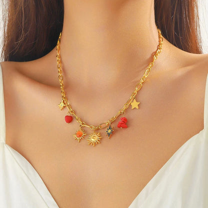 Bijoux Charm Collier à charms doré et soleils