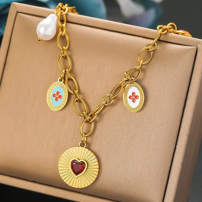 Bijoux Charm Collier à charms dorés et médaille cœur