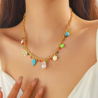 Bijoux Charm Collier à charms dorés et perles blanches