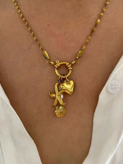 Bijoux Charm Collier à charms étoile, cœur et grelot dorés