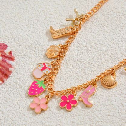 Bijoux Charm Collier charm fleur et fraise doré