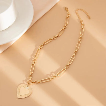 Bijoux Charm Collier charm gros cœur doré