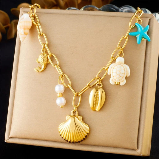Bijoux Charm Collier charm mer et coquillages dorés