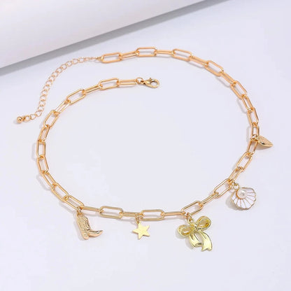 Bijoux Charm Collier charm noeud papillon doré