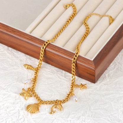 Bijoux Charm Collier doré à charms avec coquillage
